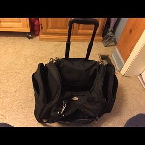 Wheeled, Multi-pocket Canvas Luggage